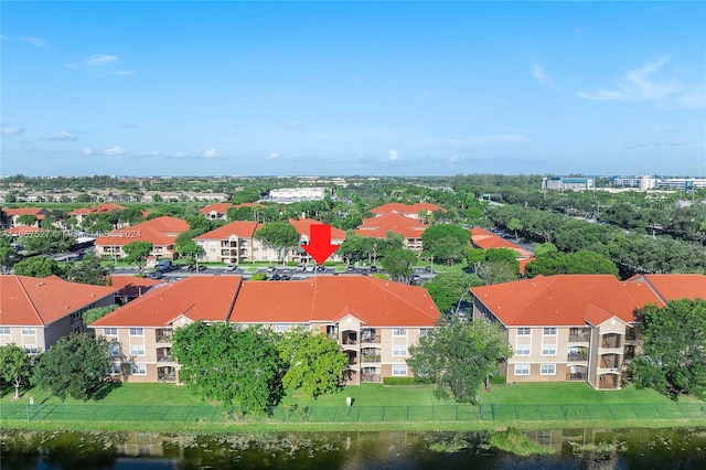 drone / aerial view with a water view