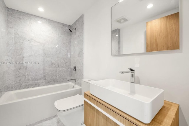 full bath with shower / tub combination, toilet, recessed lighting, vanity, and marble finish floor