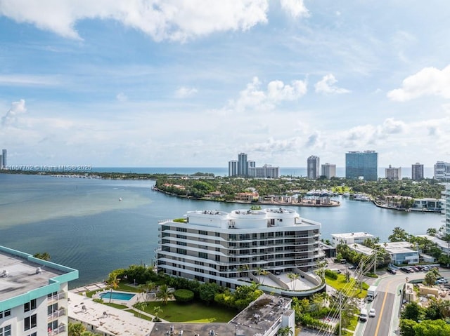 drone / aerial view with a water view and a city view