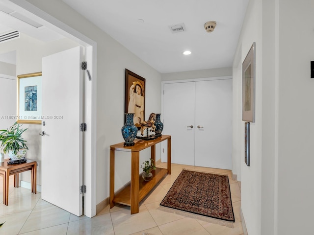 interior space with light tile patterned flooring