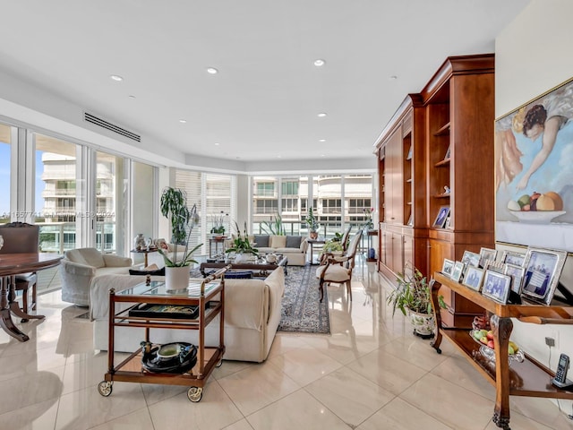 living room with light tile patterned floors