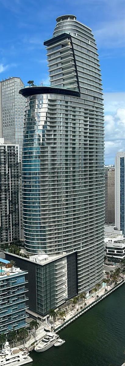 view of building exterior featuring a water view