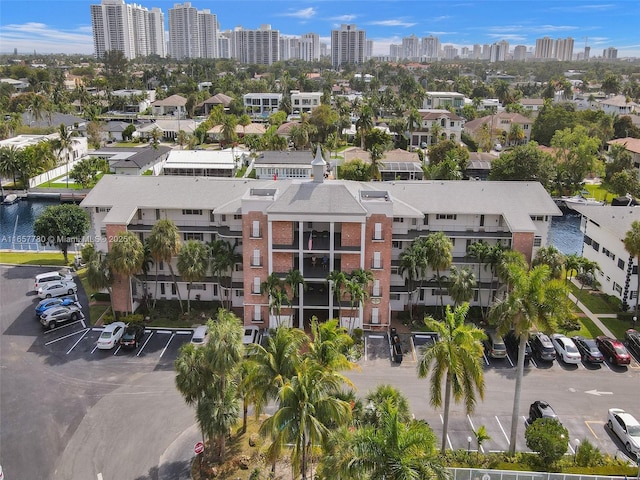 birds eye view of property featuring a city view