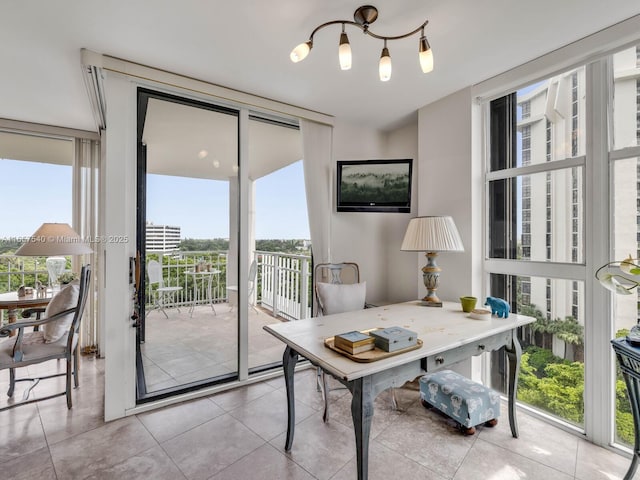 home office with light tile patterned floors and expansive windows