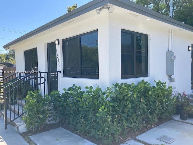 1810 NW 69th Ter, Miami, FL 33147 - view of home's exterior featuring stucco siding