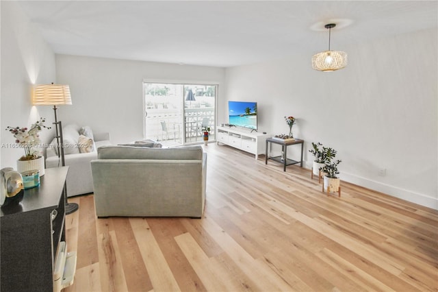 living room with light hardwood / wood-style floors