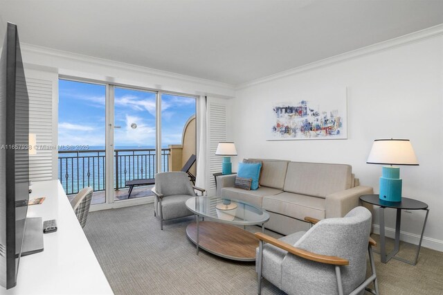 balcony with a beach view and a water view