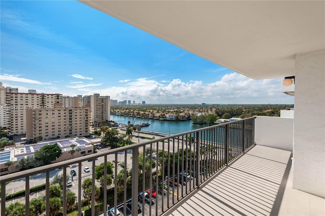 balcony featuring a water view