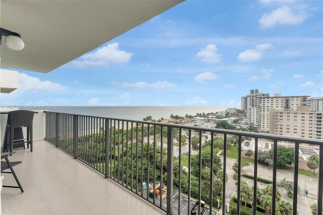 balcony featuring a water view