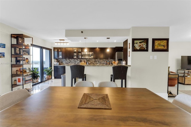 view of tiled dining space