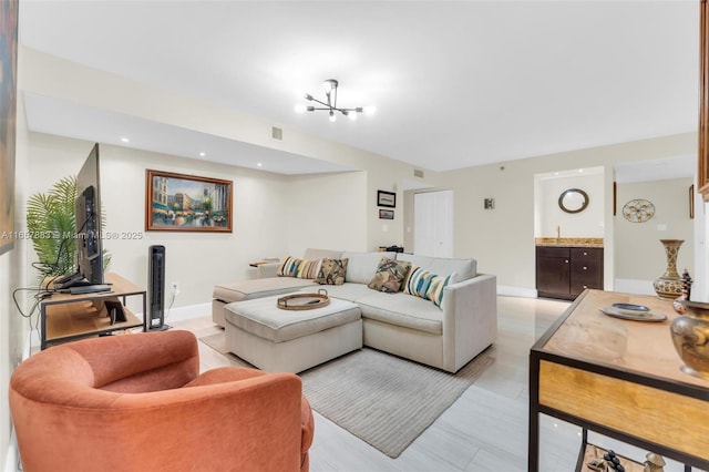 living room featuring a chandelier