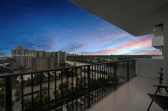 view of balcony at dusk