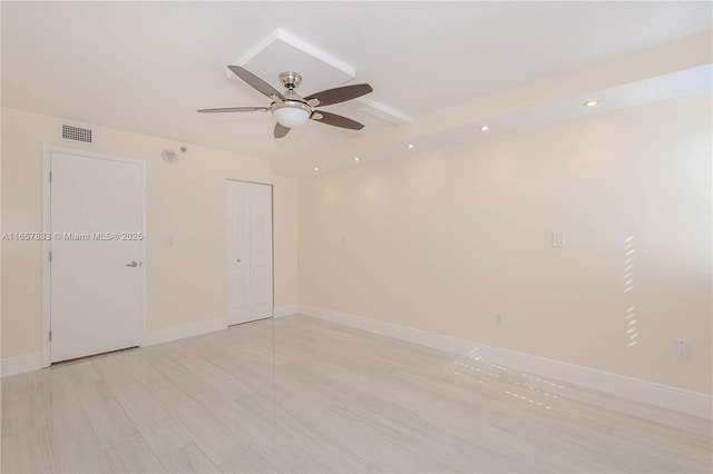 spare room featuring ceiling fan