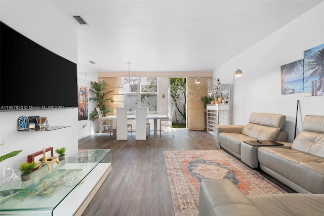 living room featuring dark wood-type flooring