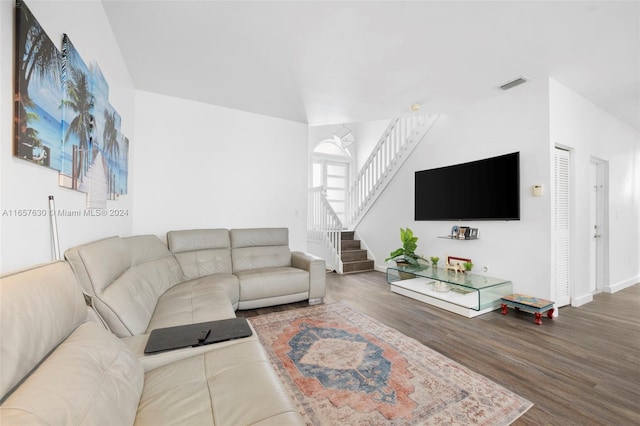 living room featuring dark hardwood / wood-style floors