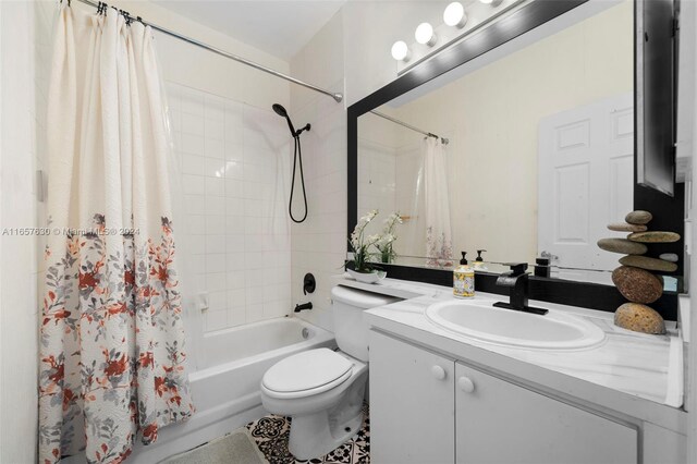 full bathroom with vanity, toilet, tile patterned floors, and shower / bath combo with shower curtain