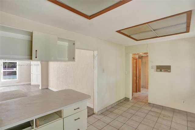 kitchen featuring white cabinets