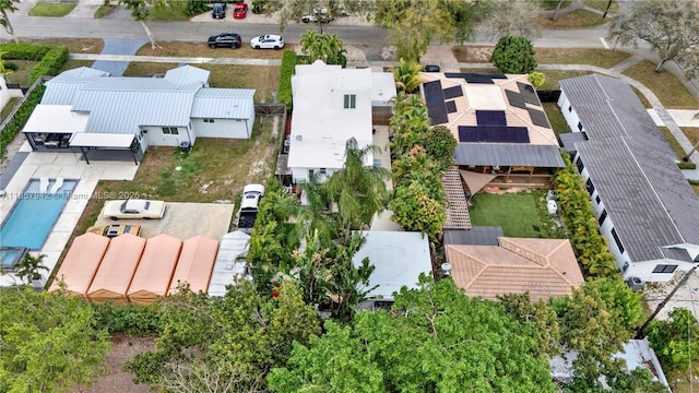 birds eye view of property with a residential view