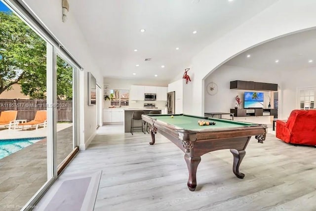 rec room featuring light hardwood / wood-style flooring and pool table