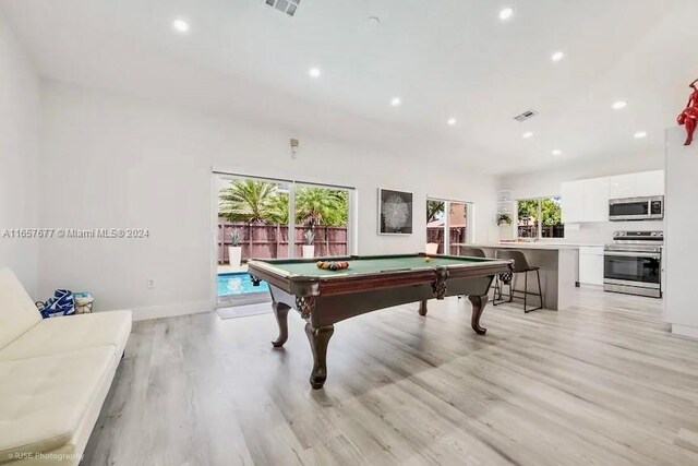 recreation room with pool table and light wood-type flooring