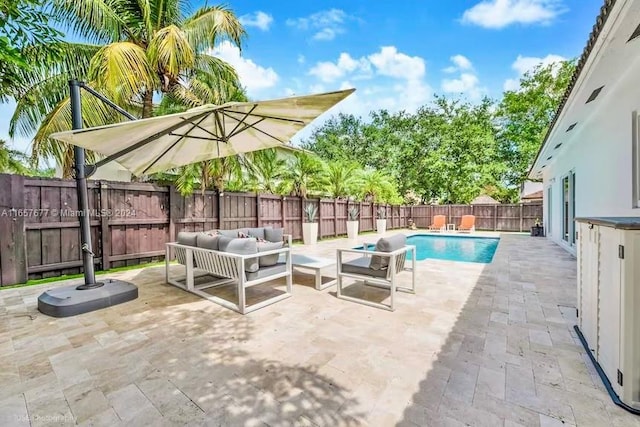 view of swimming pool with a patio area and outdoor lounge area