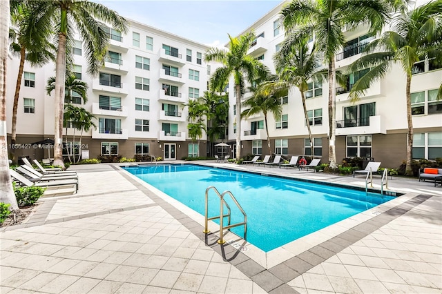 view of pool featuring a patio