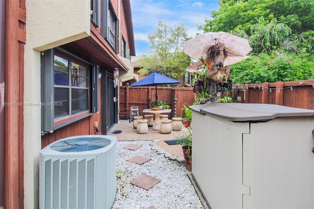 view of patio / terrace with central air condition unit