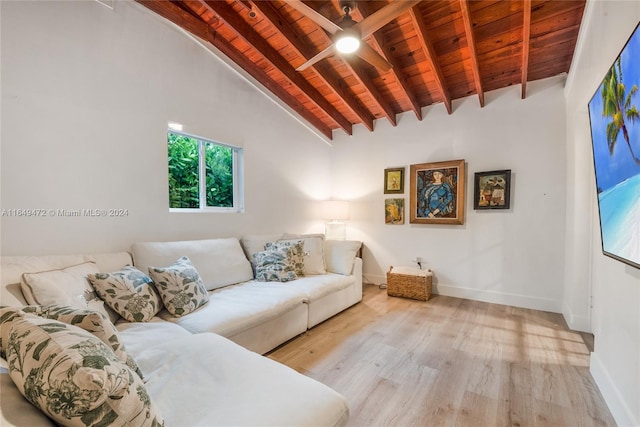 living room with light hardwood / wood-style flooring, high vaulted ceiling, wooden ceiling, beamed ceiling, and ceiling fan