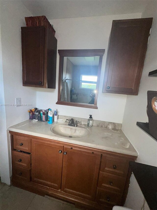 bathroom featuring vanity, curtained shower, and toilet