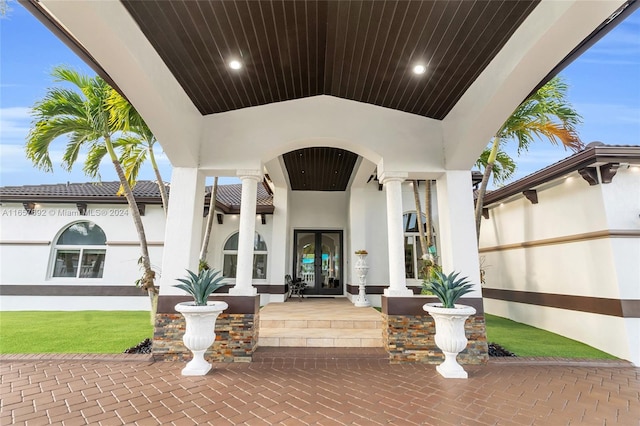 entrance to property featuring french doors