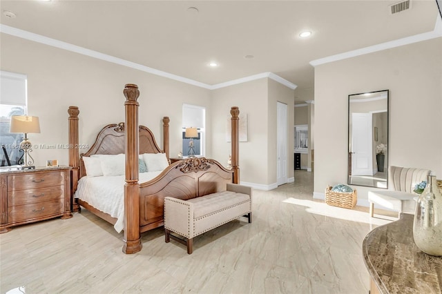 bedroom with light hardwood / wood-style flooring and crown molding