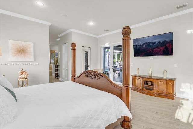 bedroom featuring ornamental molding and access to outside