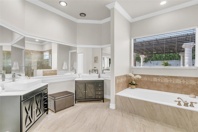 bathroom with separate shower and tub, vanity, and crown molding