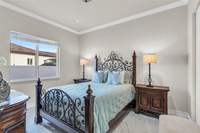 bedroom featuring light hardwood / wood-style floors and ornamental molding