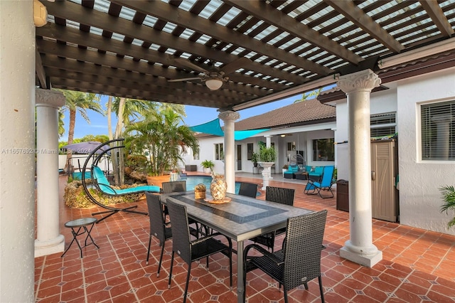 view of patio featuring ceiling fan and a pergola