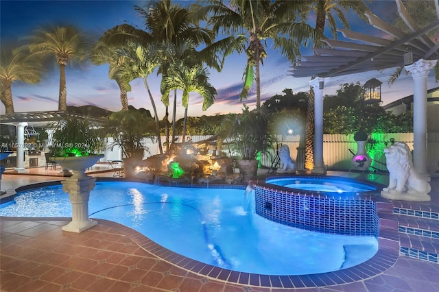 pool at dusk with a patio, an in ground hot tub, and a pergola