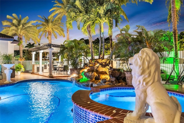 pool at dusk with a patio