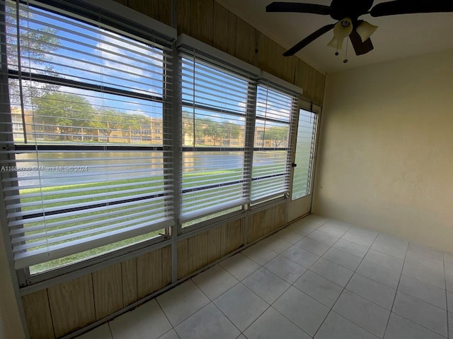 6071 NW 61st Ave Unit 107, Tamarac, FL 33319 - unfurnished sunroom featuring a water view
