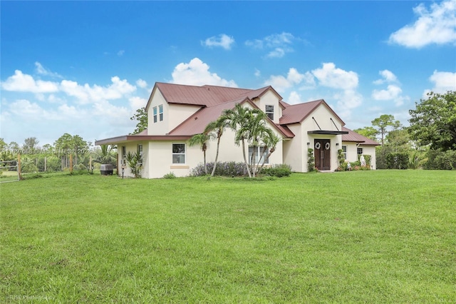 view of side of property featuring a yard