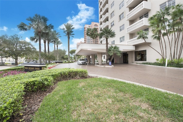 90 Edgewater Dr Unit 501, Coral Gables, FL 33133 - view of apartment building / complex with a carport