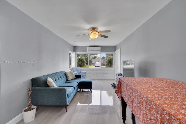 bedroom featuring ceiling fan, hardwood / wood-style flooring, and a wall mounted AC