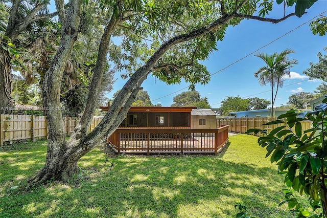 view of yard with a deck