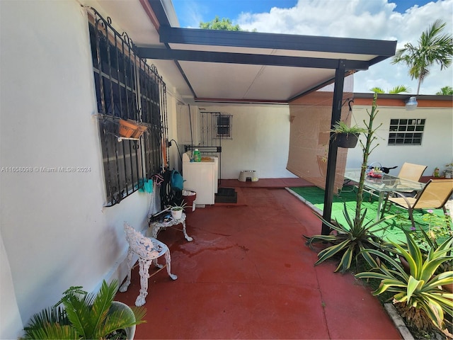 view of patio featuring washer / clothes dryer