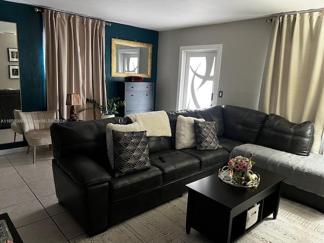 living room with tile patterned flooring