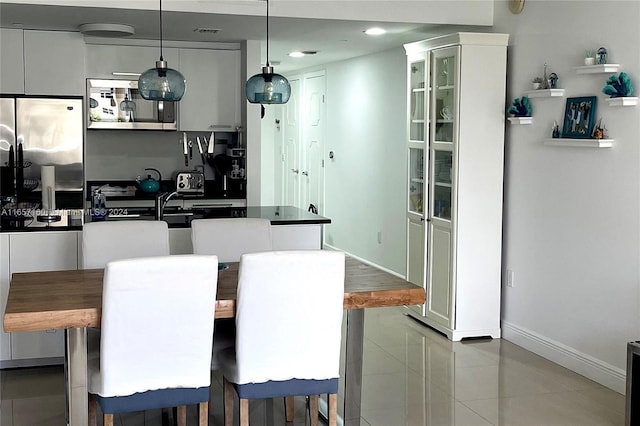 view of tiled dining room