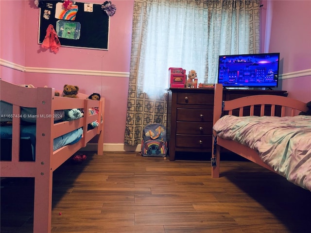 bedroom featuring hardwood / wood-style flooring