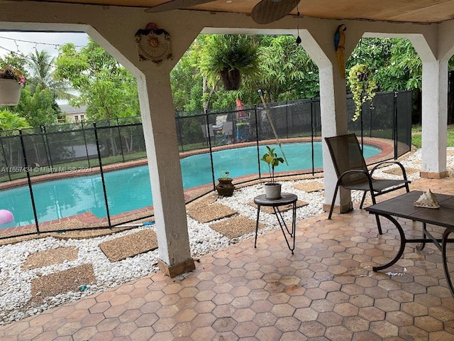 view of pool featuring a patio