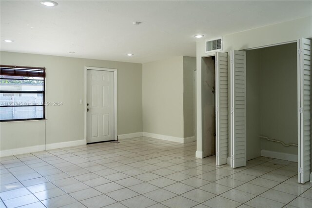 interior space with light tile patterned flooring