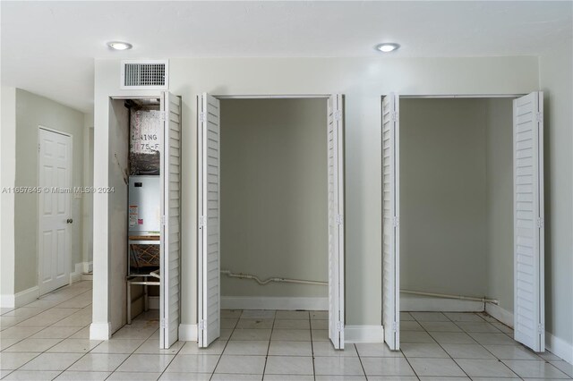 interior space with light tile patterned floors