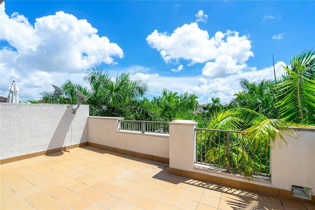 view of patio / terrace with a balcony